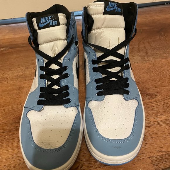 Nike Air Jordan Retro 1 High OG in White/Black/University Blue. main image 5